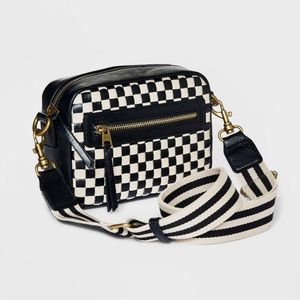 Checker cross body bag with strap.